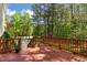 Enjoy this spacious wood deck with stairs leading to a beautiful wooded yard at 40 Holden Ct, Youngsville, NC 27596