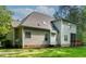Home exterior features vinyl siding, well-maintained lawn, and a screened-in porch at 40 Holden Ct, Youngsville, NC 27596