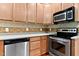 This well-appointed kitchen boasts stainless appliances, light cabinets, and plenty of counter space at 40 Holden Ct, Youngsville, NC 27596