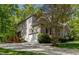Exterior shot of the house showcasing a garage and rear deck at 40 Holden Ct, Youngsville, NC 27596