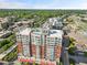 Aerial view of building highlighting rooftop pool and deck area at 400 W North St # 502, Raleigh, NC 27603