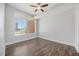 Bedroom showcasing natural light, ceiling fan, and neutral color palette at 400 W North St # 502, Raleigh, NC 27603