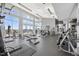 Well-equipped gym with treadmills, weights, and large windows providing plenty of natural light at 400 W North St # 502, Raleigh, NC 27603