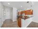 Open kitchen with stainless steel appliances and modern fixtures at 400 W North St # 502, Raleigh, NC 27603
