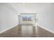 Bright, open living space featuring hardwood floors and large windows at 400 W North St # 502, Raleigh, NC 27603