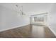 Bright, open living space featuring hardwood floors and a large window at 400 W North St # 502, Raleigh, NC 27603