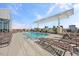 Rooftop pool with lounge chairs offering a relaxing outdoor space with city views at 400 W North St # 502, Raleigh, NC 27603