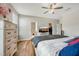 Spacious bedroom boasts a ceiling fan and access to an ensuite bathroom and closet at 403 Lagoon Ln, Mebane, NC 27302