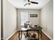 Dedicated home office featuring a black desk, rolling chair, and modern decor for a productive workspace at 403 Lagoon Ln, Mebane, NC 27302