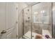 Modern walk-in shower with tiled walls, and glass door at 403 Lagoon Ln, Mebane, NC 27302