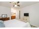 Well-lit bedroom with a ceiling fan and ensuite bathroom at 407 Gooseneck Dr # A2, Cary, NC 27513