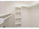Walk-in closet with built-in shelving and ample storage space at 407 Gooseneck Dr # A2, Cary, NC 27513