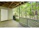 Covered patio with white railings provides a serene outdoor space at 407 Gooseneck Dr # A2, Cary, NC 27513