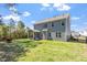 Charming two-story home features a well-maintained lawn and a screened porch, perfect for outdoor living at 421 Long Lake Dr, Fuquay Varina, NC 27526