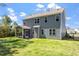 Charming two-story home features a well-maintained lawn and a screened porch, perfect for outdoor living at 421 Long Lake Dr, Fuquay Varina, NC 27526