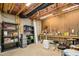 Unfinished basement with exposed ceiling and a workbench area at 44 S Wilders Ridge Way, Clayton, NC 27527