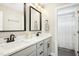 Modern bathroom with a double vanity, sleek fixtures, and a walk-in shower at 44 S Wilders Ridge Way, Clayton, NC 27527