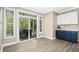Bright dining area with sliding glass doors leading to a screened in porch at 44 S Wilders Ridge Way, Clayton, NC 27527
