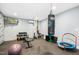 Fully equipped home gym with weights, punching bag, and fitness equipment at 44 S Wilders Ridge Way, Clayton, NC 27527
