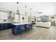 Open-concept kitchen with large island, adjacent to living space, perfect for entertaining at 44 S Wilders Ridge Way, Clayton, NC 27527