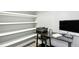 Office space featuring white shelving, a modern desk, and contemporary decor and gray paint at 44 S Wilders Ridge Way, Clayton, NC 27527