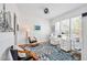 Bright office space with a large window, a modern desk, and stylish decor at 490 Boulder Point Dr, Chapel Hill, NC 27516