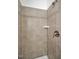 Modern shower with neutral tile, mosaic accents, and brushed nickel fixtures at 490 Boulder Point Dr, Chapel Hill, NC 27516
