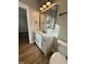 Bathroom with a modern vanity, mirror and fixtures at 50 Lakewood Dr, Roxboro, NC 27573