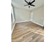 This bedroom features wood-look floors and a ceiling fan at 50 Lakewood Dr, Roxboro, NC 27573
