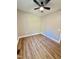 Bedroom featuring wood-look floors and a ceiling fan at 50 Lakewood Dr, Roxboro, NC 27573