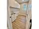 Laundry room with cabinets, sink, and hookups at 50 Lakewood Dr, Roxboro, NC 27573