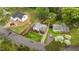 Overhead view of houses with landscaping and surrounding greenery, including new construction at 505 Forest Road Rd, Oxford, NC 27565
