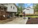 View of backyard with concrete patio, grilling area, yard and privacy features at 505 Forest Road Rd, Oxford, NC 27565