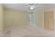 Bright bedroom with neutral walls and carpeted flooring, complete with closet and ceiling fan at 505 Forest Road Rd, Oxford, NC 27565