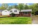 Well-maintained two-story home with a lush green lawn and mature landscaping at 505 Forest Road Rd, Oxford, NC 27565