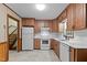 Functional kitchen with modern appliances and white countertops, perfect for cooking and entertaining at 505 Forest Road Rd, Oxford, NC 27565