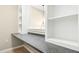 Desk space with built in shelving, neutral walls and carpet, and gray counter top at 507 Presque Isle Ln # Bldg 500, Chapel Hill, NC 27514