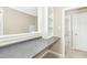 Desk space featuring built in shelving, neutral walls and carpet, and gray countertop at 507 Presque Isle Ln # Bldg 500, Chapel Hill, NC 27514
