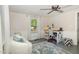 Office/bedroom with natural light, ceiling fan and modern desk area, ideal for work or relaxation at 509 N Elm St, Benson, NC 27504