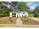 Charming single-story home with a manicured front yard and a welcoming entrance at 509 N Elm St, Benson, NC 27504