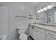 Bathroom featuring white cabinets, a marble countertop, and a bathtub and shower combination at 5604 Bobcat Rd, Chapel Hill, NC 27516