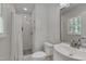 Bathroom with white subway tile shower, decorative floor tiles, and modern sink and vanity at 5604 Bobcat Rd, Chapel Hill, NC 27516