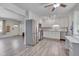 Spacious kitchen with white cabinets, stainless steel appliances, and an open design concept at 5604 Bobcat Rd, Chapel Hill, NC 27516