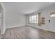Bright living room featuring a large window and ample space for furniture, ready for personal touches at 5604 Bobcat Rd, Chapel Hill, NC 27516