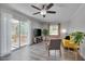 Inviting living room with sliding glass doors to deck, a ceiling fan, and a bright, airy feel at 5604 Bobcat Rd, Chapel Hill, NC 27516