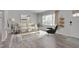 Bright living room featuring stylish furniture, a large window, and elegant decor with a decorative rug at 5604 Bobcat Rd, Chapel Hill, NC 27516
