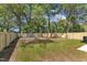 View of the large, fenced backyard, offering plenty of space for outdoor activities at 621 Ray St, Selma, NC 27576