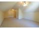 Large bonus room has carpet, ceiling fan and good lighting at 627 Carraway Dr, Graham, NC 27253