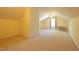 Large bonus room has carpet, ceiling fan and good lighting at 627 Carraway Dr, Graham, NC 27253