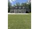 Charming home with a full front porch, dormer windows and mature trees surrounding at 6283 Harrisontown Rd, Rocky Mount, NC 27804